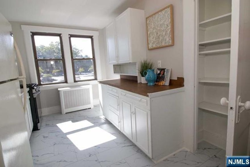 Warm & welcoming 2 bedroom apartment in the heart of downtown Glen Rock! Large kitchen with plenty of cabinets, storage & new stove. Very large dining room leads to a spacious living room with lots of natural light. Newly remodeled bathroom & 2 bedrooms complete the layout. Close to all GR schools as well as NYC transportation with 2 train lines & buses. Center of town shopping & restaurants. Tenant pays gas & electric. Water is included. Window AC units included. Portable dishwasher included, "as is". Pets negotiable. Lease application, credit check, NTN report & interview required. (Note: photo's from prior listing where apartment had installed all new floors and fully painted.)