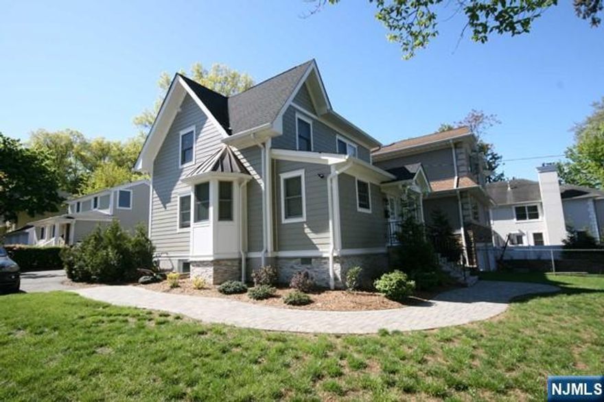 Totally gutted out and remodeled top bottom 2 family home. This unit has the first floor and the basement. Almost new in every aspect. New white cabinetry kitchen with all newer appliances, all new windows, 3 bedrooms and a new full bath with a glass shower door. All new hardwood floors, C/A/C, Washer/Dryer in the unit, etc. Nicely finished newer basement w/luxury vinyl flooring has a powder room, laundry room and storage. You will not be disappointed for this affordable priced rental property in highly recommended school district. Drive way is on N Summit. 2 car parking spaces, landscaping and snow removal are included.