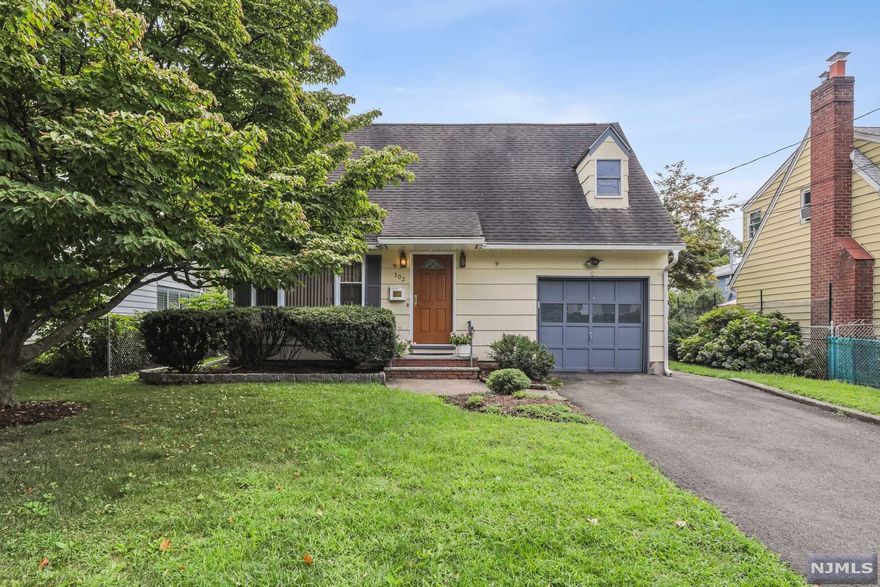 This well maintained charming Cape offers hardwood floors throughout, central air, a bright airy living room, dining area with large windows leading to a kitchen, powder room and entrance to a spacious enclosed backyard, covered patio and one car garage.The second floor has two roomy bedrooms, a full bath and a walk-in attic perfect for expansion. The lower level features an unfinished basement with high ceilings, new washer and AC less than two years old.