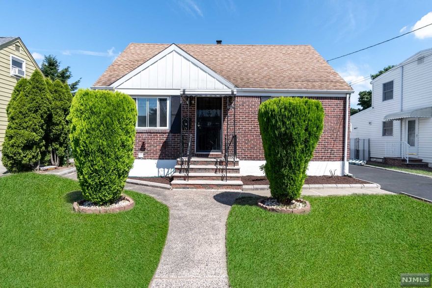 Location Location Location!! Expanded cap code on a large level double lot with 2 kitchens. You will feel welcomed as you enter into the sunlit oversized living room with hardwood floors that leads to a large eat-in kitchen with a side entrance to the fenced-in backyard; two bedrooms and a full bath complete the 1st floor. The upper lever includes an extra large bedroom and tons of storage closets. The lower finished basement includes a laundry room, 2nd kitchen, full bath, and family room. Home is accessible from Hamilton Ave. and also includes driveway access from 18th Street with two single-car garages that are back to back. House is on a quiet street, near shopping, school, and bus stop. Easily accessible to the highway. Don't miss the chance to move into Elmwood Park township!