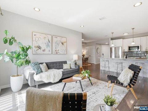 Photo of 302 Palisade Avenue #404, Jersey City, NJ 07307 (MLS # 26014931)