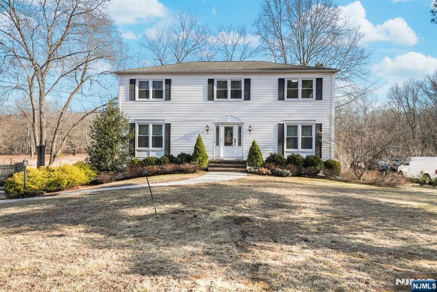 This beautifully updated colonial home offers a spacious layout, with a standout feature being the expansive kitchen and bright breakfast area. Oversized windows flood the space with natural light, creating a warm, inviting atmosphere that extends to the large panoramic deck, perfect for outdoor living. Located in the top-rated Chatham school district, this home is ideal for families. Renovated in 2021, the home is in pristine, move-in-ready condition with complete high quality furniture such as a sofa, bed frames, dressers, dining table, and chairs, everything you need to settle in immediately. Conveniently located, the home is just 7 minutes from Summit train station, 8 minutes from Chatham train station, and a short 5â€“7-minute drive to I-78. The property also features 2 attached car garages, a spacious front yard, and a large backyard will offer plenty of space for family living.