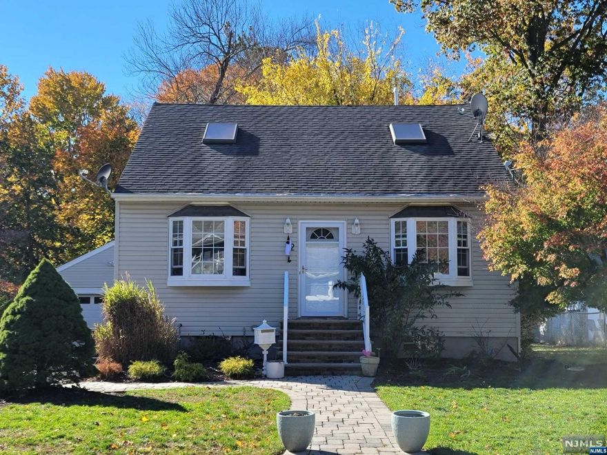 Welcome Home! This 3 Bedroom, 2 Full Bathroom Cape Cod is New to the North Haledon Market and Ready to be Called Home! The 1st Floor features an Open Concept with a Kitchen, Dining Room / Living Room Combo, Bedroom, and Bathroom. The 2nd Floor features 2 Bedrooms, both with Walk-In Closets, and the 2nd Bathroom. Use your Imagination to complete the Full Unfinished Basement with Laundry Area, and Utilities. Sliding Door in Kitchen leads out to a Full Private Deck overlooking the large level yard. Plenty of parking for up to 8 cars leading up to a Detached 2 Car Garage! Enjoy the Wonderful Community that North Haledon has to offer! Close to Schools, Parks, Shopping, Places of Worship, and Major Highways! LOW TAXES!!! Taxes only $7074. 1 Year Home Warranty Included with Purchase!