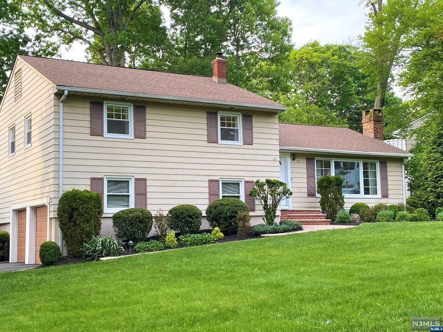 MOVE RIGHT IN TO THIS IMMACULATE 4 BEDROOM, 2.5 BATH SPLIT LEVEL HOME, LOCATED IN THE HEART OF THE BROADLAWN SECTION OFLIVINGSTON. SPECIAL FEATURES INCLUDE: NEUTRAL DECOR, NEW EAT-IN KITCHEN WITH BREAKFAST BAR & CUSTOM CABINETRY, QUARTZ COUNTERS &STAINLESS APPLIANCES. WOOD FLOORING THROUGHOUT. PRIMARY BEDROOM WITH WALK-IN CLOSET & UPDATED BATH WITH OVERSIZED STALLSHOWER. THE LOWER LEVEL HAS A 4TH BEDROOM/OFFICE/GUEST ROOM WITH SPERATE ENTRANCE, POWDER ROOM & LAUNDRY ROOM. RECREATIONROOM, GYM AREA & UTILITIES IN BASEMENT. LARGE DECK OFF KITCHEN. BEAUTIFULLY LANDSCAPED LEVEL PROPERTY & 2 CAR GARAGE