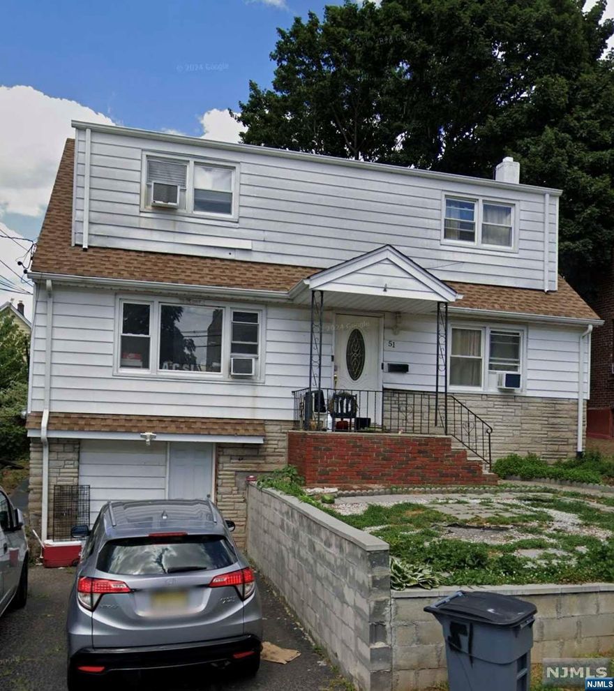SHORT SALE APPROVAL REQUIRED. TWO FAMILY HOME FEATURING 5 BEDS 2 FULL BATHS, KITCHEN, LIVING ROOM, BASEMENT AND ATTACHED GARAGE. GREAT LOCATION NEAR ALL TRANSPORTATION WITH EASY ACCESS TO NYC. PROPERTY REQUIRES TLC AND WILL BE SOLD COMPLETELY AS IS.