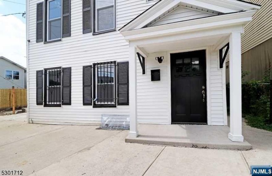 Looking for a new home or an opportunity for a In-Law Suite. This updated home has a modern lifestyle design and much more. The open floor plan makes it easy to entertain or just relax. Completely re-done with quality workmanship. the home has been completely redone with quality workmanship. 1st floor unit is a 1 bedroom while the 2nd floor unit has two levels, kitchen with center island, large living room dining room combo. 3rd floor have two generous size bedrooms. Don't miss out on this get the keys unpack your things and move in.