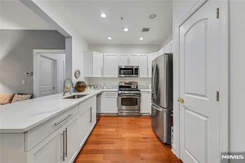 Photo of 2107 Windsor Park Court #107, Englewood, NJ 07631 (MLS # 26028696)
