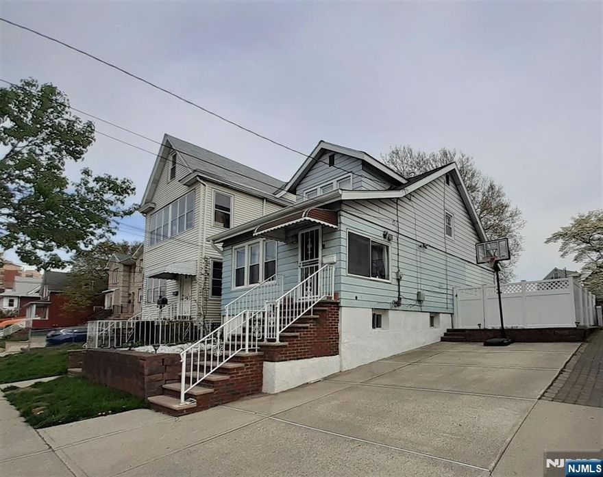 Welcome to this Gorgeous Upgraded Colonial Home, located on one of the Best Garfield Areas, convenience to Local & NY Commuters, just a few blocks to Train Station, Buses, Schools, Parks, Shops. Features on 1st Floor: Enter Foyer with Ceramic tiles Floor & French Door, Family Size Living Room with Fireplace, Computer Room/Den, Formal Dining Room, New Hardwood Floors throughout, Renovated Modern Eat in Kitchen with Peninsula, Costumed White Cabinets, Granite Counters Tops and Glass door Pantry, Hallway with door overlooking the Large Big white Fenced Back Yard with Gazebo & Patio with Furniture Included and the New Ceramic Tile Full Bathroom finished the 1st Fl. 2nd Floor: Master Bedroom, Regular Bedroom, Recessed Lights, New Ceramic Tile Full Bathroom. Attic/Storage and Unfinished Basement with Laundry Area, Toilet/Sink and Bilko Door to Exit. Driveway for 4+Cars. Please don't Allow Pets/Smoke. This Charming and the Location makes your life Easy.