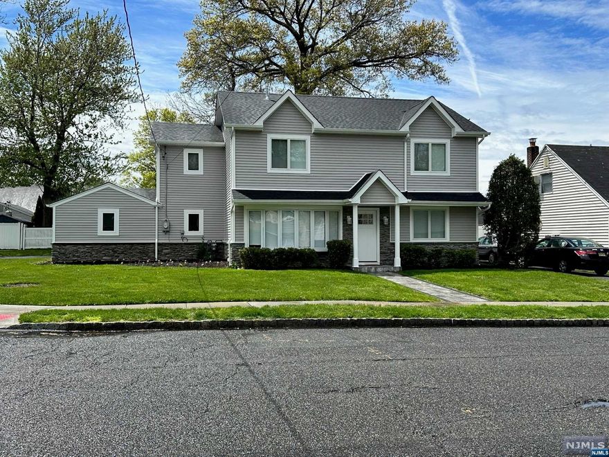 One of A Kind Colonial - Renovated Modern Home! A Double Corner Lot Providing A Great Deal of Privacy and Play Space. This Spacious Modern Home Comes Brings 5 Bedrooms & 3 Full Baths! The Open Floor plan is Perfect for Full House Living & Entertaining! The Detailed Wrought Iron/Wood Staircase Provides is a Center Focal Point Leading to 2nd Fl Primary Bedroom w/ a Large On-suite, w/ Amazing Black and White Marble Finishes & 2 Nice Size Closets. The Fl. Also Provides 3 More Bedrooms & A Main Bathroom. The Less Than One Year Old Foundation, Framing, New Electric, New Plumbing, and 2 New HVAC systems for all levels Provides Peace of Mind for years to come. The Outside Comes with New Stone Bottoms, Upper Vinyl siding & 40+ Year Timber Roof. Home has ALL New Floors throughout, Less Than a Year old Home Appliances Featuring Stainless Steel Smart Appliances, Thermostat and Doorbell enabled. The Kitchen comes with High-End Finishes and a Breathtaking Breakfast/Sun Room. Will Not Last