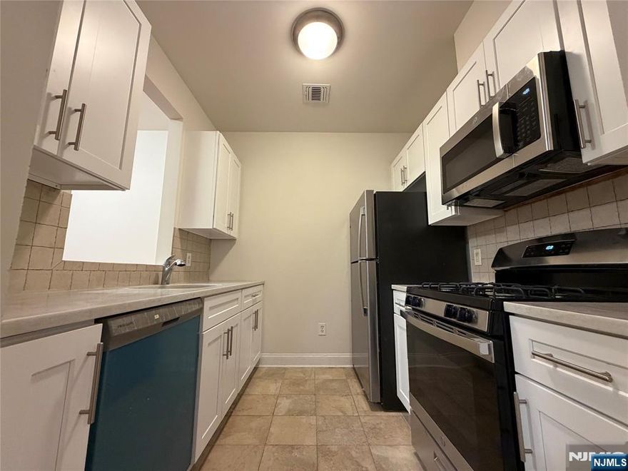 **FIRST MONTH FREE on a 13-month lease + one parking space included! - for occupancy commencing on or before 2/1/26!** Welcome to 2022 Central Road in Fort Lee! Modern 2-bedroom 2-bathroom unit available in a walk-up building on the third (TOP) floor. Featured in this desirable unit, you will find BRAND NEW kitchen cabinets and appliances(!), hardwood floors throughout, high ceilings, kitchen featuring granite counter tops and top of the line stainless steel appliances, central air conditioning as well as ample living & closet space! (Shared) Laundry room on site (coin)! Prime location(!!) - blocks away from all new restaurants and shops in Fort Lee & blocks away from transportation to NYC! Ideal location for commuters! PARKING: 1st space INCLUDED IN THE RENT(!); Additional space - $125/monthly! Pet friendly (25 lb limit) $500 pet fee + pet rent per month! Tenant is responsible for ALL utilities! Non-refundable move-in fee applies! Reduced security offered to qualified applicants! Available immediately - virtual tour available upon request!