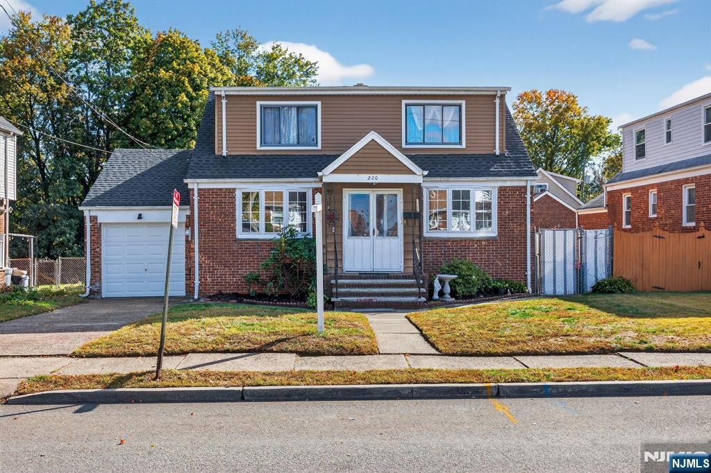 Photo of 220 Hillman Drive, Elmwood Park, NJ 07407 (MLS # 25037844)