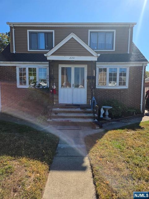 Photo of 220 Hillman Drive, Elmwood Park, NJ 07407 (MLS # 25037844)