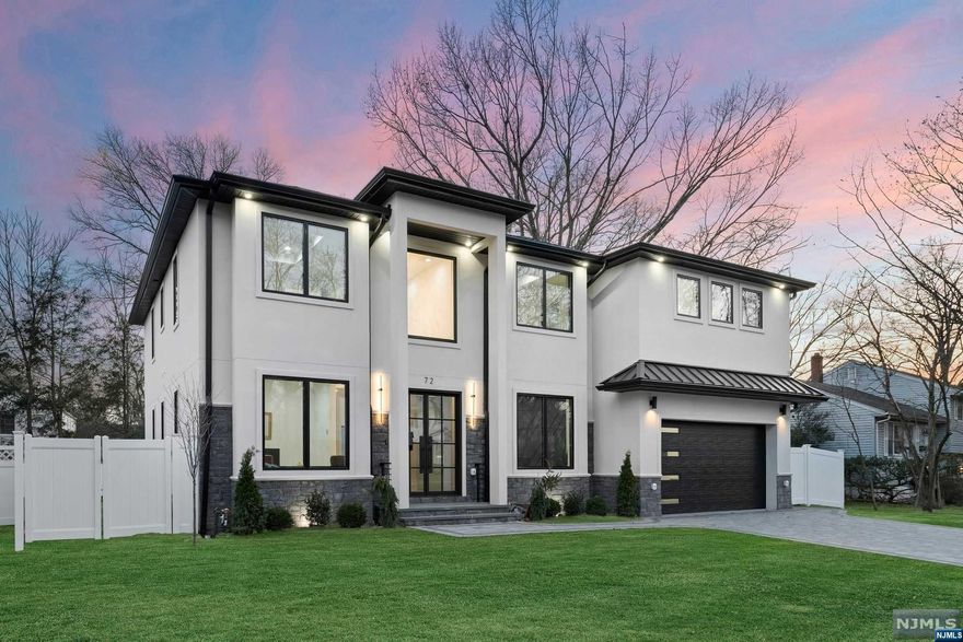 Sleek & Modern New Construction Home built by top Bergen County builder in the ultra-desirable West side of town, bordering Ridgewood. Discover this 6,000 sf elegant luxurious home featuring 6 bedrooms & 5.5 bathrooms on a sizable 75 x125 lot.A stunning 2 story entry foyer leads to a formal Living & Dining Room which flows to a stunning, bright 2-story Great Room. Beautiful moldings, woodwork & lighting throughout.The designer kitchen features Quartz waterfall countertops, Sub-Zero & Wolf appliances, & a huge walk-in pantry, conveniently located off the 2-car garage w mudroom.The main floor also includes a bedroom en-suite. The second level offers a dreamy Primary Suite with a grand WIC to a spa-like bathroom, 3 additional great sized guest bedrooms, & 2nd flr laundry. The amazing fully finished lower level is complete with a theater, gym, a bedroom, full bathroom & rec space/storage. Enjoy easy access to schools, parks, shopping, & major highways