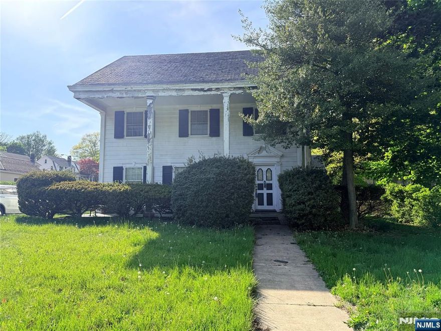 Opportunity awaits at 599 S Center Street, located in the sought-after Seven Oaks section of Orange. This spacious home offers exceptional potential for buyers looking to customize and add value. Featuring classic hardwood floors throughout, the first level includes a welcoming living room with fireplace, a formal dining room, and a generously sized eat-in kitchen. The second level offers three well-proportioned bedrooms, all with hardwood flooring, providing comfortable and functional living space. The third level expands the homeâ€™s versatility, featuring a generously sized bedroom with hardwood floors, a loft area ideal for a home office or flexible use, a full bath, and a walk-in attic offering excellent storage options. A large unfinished basement provides additional opportunity for customization or storage and includes a newer gas furnace and hot water heater (approximately 5 years old). Additional features include an attached one-car garage, patio space, ample closet storage, and an extended driveway accommodating multiple vehicles. Property is being sold strictly as-is. Buyer is responsible for obtaining the Certificate of Occupancy and completing any required municipal inspections or repairs.