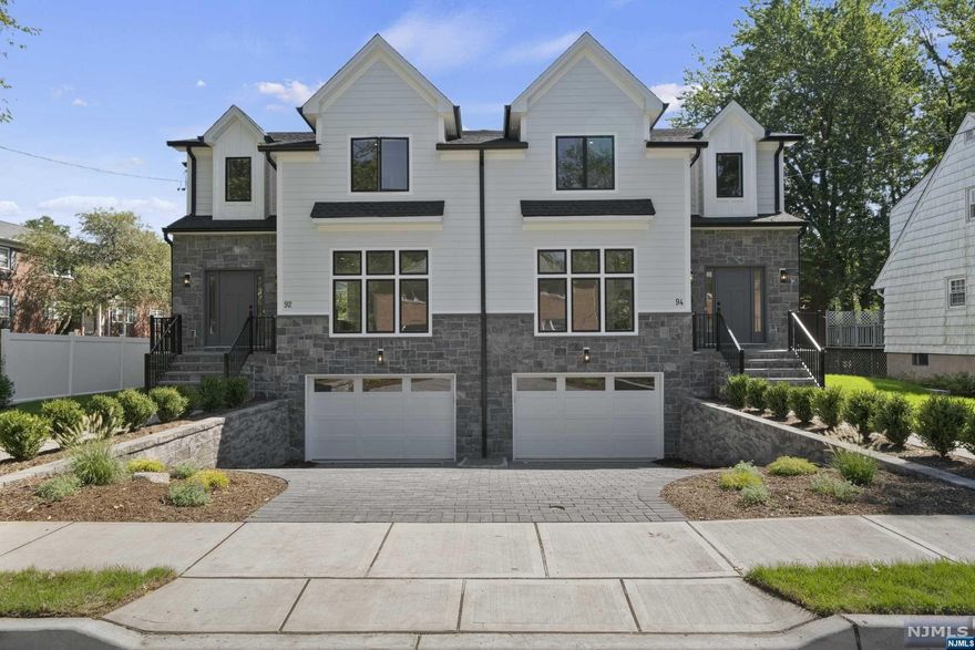 This modern NEW CONSTRUCTION LUXURY TOWNHOUSE IN TENAFLY makes a statement. The Interior features high end finishes from hardwood floors to tiling. First Floor 9FT CEILINGS, features a large entry foyer, a bright sunny living room, powder room, open layout family room & dining room, large chef's kitchen with stainless steel appliances, 7 foot center island, quartz countertops. 2nd floor offers master bedroom with master bath, large walk in closet, 2 spacious en suite bedrooms, a large laundry room, Lots of closet and storage space. Ground floor an additional large family room/rec room, a bedroom and a full bath, utility room. 1 car garage, full house generator, central vacuum, central air, Anderson windows, wired alarm system. Close to downtown, public transportation, schools and houses of worship.