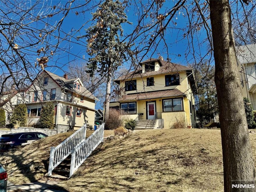 This is a spacious 4 Bedroom Stucco Colonial w/great living space sitting on a 50-foot wide by 150 deep lot w/a park-like backyard offering a large welcoming LR w/cosmetic FPL and new carpeting over HDW floors. It also offers a nice FDR that faces the backyard & invites an enclosed side sun porch. EIK is large and can accommodate a big family table & has plenty of kitchen cabinets, counter space & a mud room leading to yard. All 4 BRs are on the 2nd floor w/a spacious hallway, full bath & hall entry to a big high ceiling storage attic with great finishing potential for extra living space for today's large families. Basement is full size, large & has more to offer. Located in a very convenient neighborhood: Walk to NYC Bus, schools, library, borough hall, post office, bank, swim club & the newly renovated town park & HS sports complex. If you are looking for a great size authentic home, this is the one. Home priced to sell in "as is" condition...