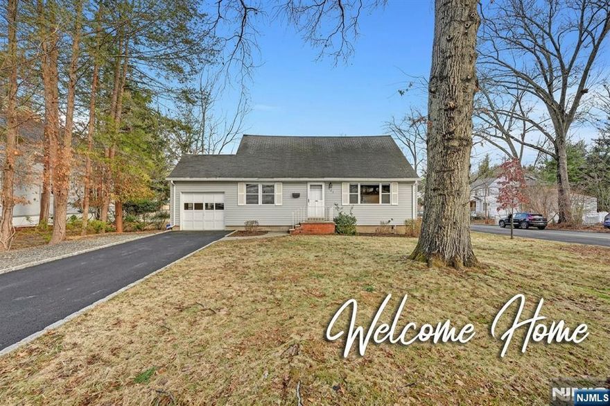 Charming home in excellent location in highly desirable town of Closter, known for its top rated schools and booming downtown, all within walking distance to top rated Northern Valley Demarest HS, Stop & Shop and Closter Plaza. Features hardwood floors throughout, three generously sized bedrooms, 2 updated full bathrooms, and a beautifully updated kitchen with wooden cabinets, stainless steel appliances, and a door to a beautiful deck overlooking a fully fenced in, oversized, flat backward. Finished basement with perfect for rec room and additional storage, and separate laundry room. This home's east and west exposure provides great natural sunlight. Well trained pets welcome.