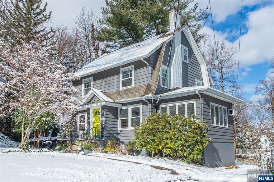 This gorgeous sun-drenched home is move in ready! Set on beautiful tree-lined street in Upper Montclair, and close to NYC transport and parks, #157 has wonderful open flow and charm at every turn. Expansive living room with beamed ceilings and wood burning fp. A light-filled over sized sunroom is the perfect family room, and there's a separate office area too. Generous sunny dining room leads to fabulous kitchen complete with 36" Bertazzoni range and dishwasher, all new windows, high gloss cabinets and butcher block breakfast bar. Renovated powder room too. Back door leads to private deck and oversized back yard. second floor has 3 beds (one is enormous) and refreshed bath. Third floor has private bedroom and updated bath with clawfoot tub/shower and loads of storage. A full unfinshed basement has high ceilings, bonus powder room, laundry and walk out and endless expansion possibilities. Garage has electricity.