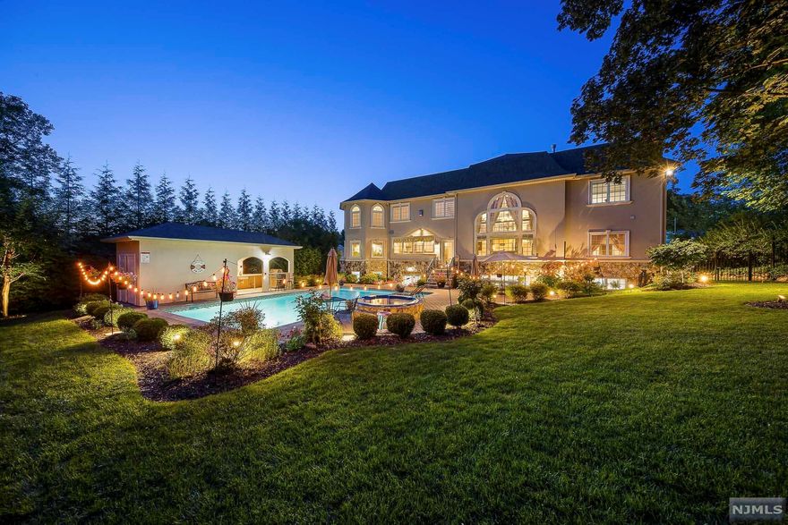 Approximately 8,700 Sq ft custom built luxury oasis in the booming low tax town of Paramus. Great location for commuters! The virtual tour link contains a comprehensive video tour of the entire estate, along with floorplans, an interactive 3D Matterport model, a full written description, and many additional photos. Click on the 'virtual tour' link.