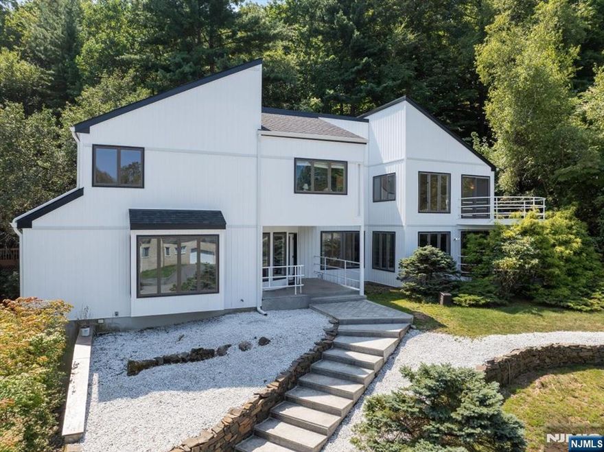 Welcome to this spacious 4,400 sf and modern 4-bedroom, 3.5-bath property, offering freshly painted interiors and new batten board siding, ready for you to make it your own. With a brand new roof, new HVAC system, and freshly painted deck, this property offers peace of mind and effortless living from day one. Inside, the generous layout provides a clean, neutral paletteâ€”an open invitation for you to customize every detail to reflect your personal style. Large windows fill the home with natural light, highlighting the flexible living spaces perfect for both relaxation and entertaining. Living room has 20ft ceilings. Outside, the groomed and manicured landscaping creates beautiful curb appeal, while the expansive yard offers endless possibilities for outdoor living and entertaining. Every inch of this home has been carefully prepared so you can move right in and start imagining your dream design. This is more than a homeâ€”itâ€™s a blank canvas in an ideal setting, ready for your vision. More pictures & floor plans coming soon.