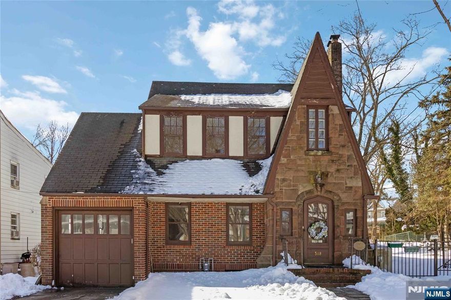 Close to the beautiful Ridgewood downtown with cafes, restaurants and shops, this distinctive three-bedroom Tudor offers character, warmth, and an unbeatable location. Freshly painted, the main level features a welcoming entry hall that flows into a bright living area with a wood-burning fireplace, a generous dining space, and an adjoining kitchen. A convenient powder room, breakfast nook and a screened porch provide additional functionality and comfort. Upstairs, youâ€™ll find three comfortable bedrooms, a full bathroom, and access to a walk-up attic for extra storage. Situated just moments from NYC bus and train service and part of Ridgewoodâ€™s highly regarded school system, this home blends historic charm with everyday convenience in a sought-after neighborhood setting. One attached garage and parking space on the driveway. Credit check required. Tenant is responsible for landscaping, snow removal and first $100 of each repair. Owner holds NJ RE License.