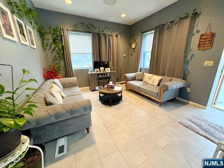 The Apartment is behind the Store front which is also for Rent. Apartment offers updated kitchen, laundry room, Living Room & two Bedrooms. Large Closets Full bath. Finished basement with additional rooms and half bath. Off street parking . Close to Transportation , Schools and shopping.