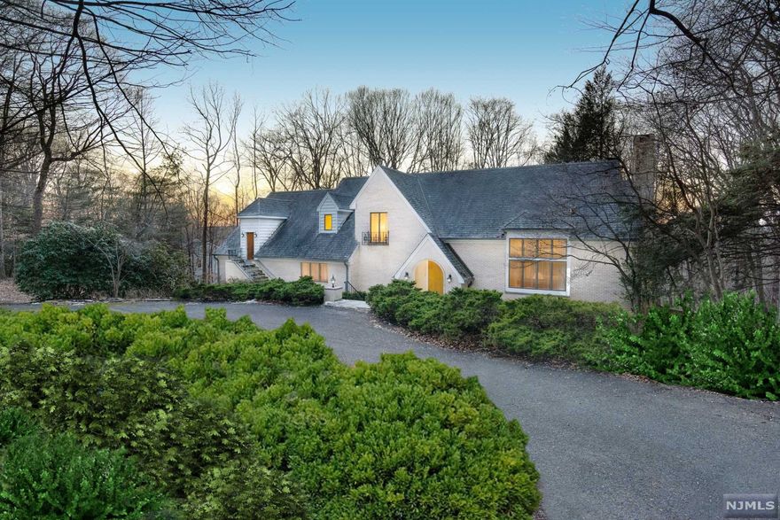 PRESTIGIOUS CHESTNUT RIDGE LOCATION! Beautiful Manor Home sitting on 2 Acres of Private Grounds invites you in with it's breathtaking 2-Story Entry Foyer. 19' Cathedral Ceilings grace the Great Room with a Dramatic Floor-Ceiling Crackling Fireplace. The Living Room features a 2nd Fireplace and the Kitchen is Magnificent. It naturally flows to a Spacious Deck overlooking your Private Yard on one side and seamlessly marries with the Formal Dining Room. 1st Fl Master Suite with Loft/Office + Sep Entrance, Laundry Room, Powder Room complete the Entry Level. Upstairs boasts 3 additional Generous Bedrooms, Hall Jack & Jill Bathroom. Spectacular Sunset Views. Walkout finished lower level enjoy a Summer Kitchen, Office/Possible 5th BR, 2nd Living Room (many options), Full Bath, and Workshop. 3 Car Garage. Must Be Seen - Call Today!