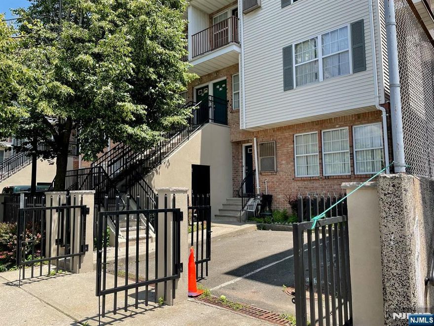 Beautiful townhome in the Heart of Ironbound! Welcome to this stunning townhome nestled in the vibrant Ironbound neighborhood where historic charm meets modern city living. This sunlit 2-bedroom 2.5 home offers an open-concept layout with sweeping views of the city, creating a bright & welcoming atmosphere from the moment you step inside. The spacious kitchen is perfect for everyday living and entertaining, featuring generous counter space, ample storage and a peninsula breakfast bar that opens to the dining area & family room. The open flow between spaces makes them ideal for both relaxing and hosting. The primary suite is a true retreat, complete with private bath, walk in closet & spectacular views! The secondary bedroom also enjoys beautiful vistas & ample space. Throughout the home, you will find gleaming hardwood floors, in unit laundry, abundant storage & your own private balcony perfect for enjoying the view. Dedicated parking is included for your convenience. Located just blocks from the Prudential Center and minutes to Newark Airport, this home is a commuter's dream. Step outside & explore a neighborhood rich in culture, cozy cafes, diverse restaurants & historic character.