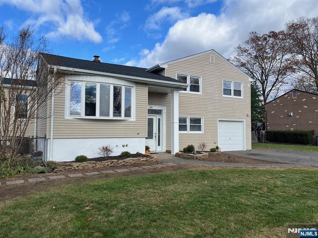 Photo of 88 Cedar Road, Dumont, NJ 07628 (MLS # 25040886)