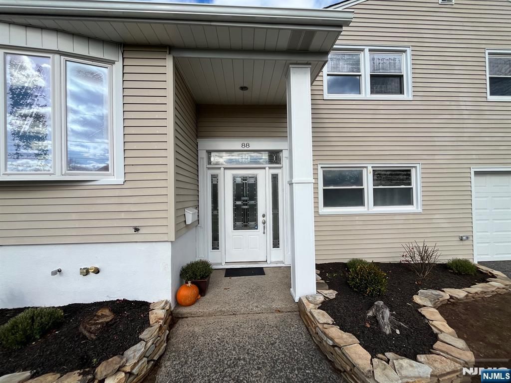 Photo of 88 Cedar Road, Dumont, NJ 07628 (MLS # 25040886)