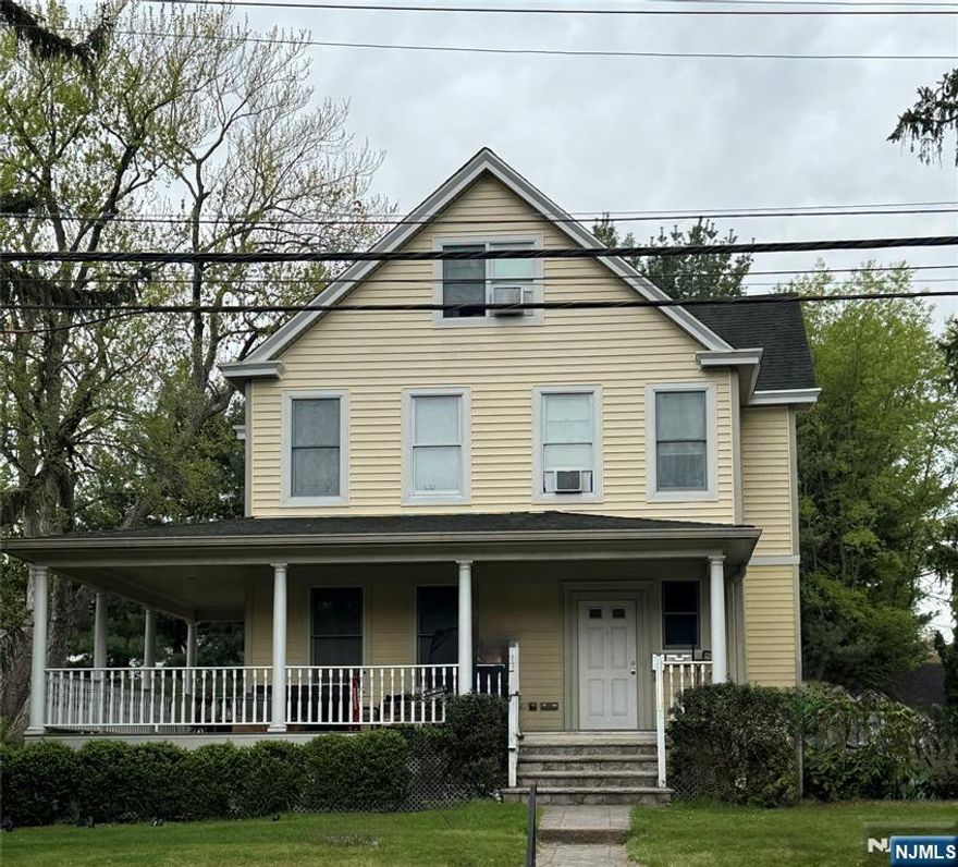 Rare opportunity to own a lovely 2-family Victorian home in Closter. Well-maintained with a charming wrap-around porch, large, double-wide property, vinyl siding, ducted for central air (needs units), updated kitchens and baths. 1st floor rental is an open floor plan w/ 1-bedroom, Living Room, Kitchen w/granite counter, woodburning Fireplace, Full Bath and washer/dryer in unit. 2nd/3rd Floor unit has 3 bedrooms, 2 Baths, Living Room*, Kitchen w/ granite counters, Full Bath and washer/dryer in unit. *Living Room and a Full Bath are on 3rd Floor w/ deck access. Ample Parking for both unitsAnd shared yard use. Can be converted back to a 1-family (with a zoning permit). Full, unfinished basement with ample ceiling height has utilities, storage, french drain and plumbing for addt'l bathroom. Shed â€œas isâ€. High ranking schools and short walk to transportation, shopping and parks and everything the fabulous town of Closter has to offer.