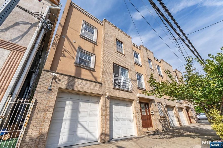 This renovated 3-level townhouse offers the perfect blend of modern updates and spacious living. Built in 2010 and fully renovated in 2024, this 3 bedroom, 2.5 bath home has it all. The main level features a bright, open floor plan with a living room, dining area, and a gorgeous kitchen with a large island, ample counter space, and stainless steel appliances, including a dishwasher and refrigerator. Hardwood floors extend throughout all three levels. Enjoy the convenience of an in-unit washer and dryer, a private balcony for morning coffee, and a backyard perfect for relaxing or entertaining. The attached 2-car garage provides direct access to both the ground level and the backyard. Small dogs are welcome. Available now. Background check, credit check, and income verification are required.