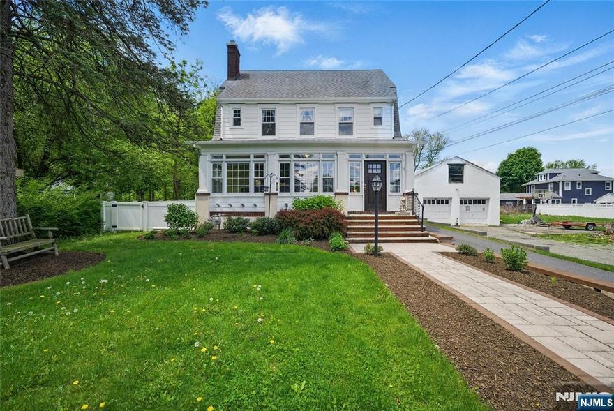 Best of both worlds- 19th century character & charm with updated modern day functionality. The lovingly restored center hall colonial, features beautifully stained woodwork, original pine floors, solid wood wainscoting, crystal door knobs & large windows. The living room boasts custom built-ins and a stunning wood burning fireplace & across the foyer, formal Dining w/upholstered & cushioned wallpaper that adds a sense of classic luxe charm. Cozy office or sitting room overlooks the bag and a large & bright sunroom showcases the front! Large Kitchen includes solid wood cabinetry, a tile backsplash & SS appliances. Convenient 1st floor powder room. This home is ready to entertain & impress! Upstairs, 3 ample bedrooms & a full bath. Third floor offers a 4th bedroom with vaulted ceilings & tons of natural light. SO much curb appeal. Tons of parking & storage in bsmt & a 2 car detached garage. In ground pool with patio & lovely perennial gardens. Easy access to major hwys & NYC direct transit.