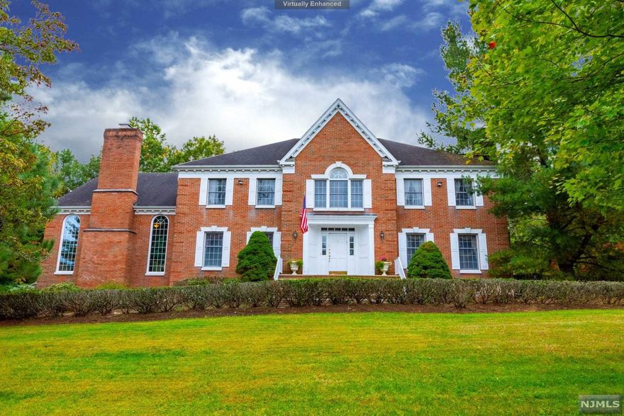 Located in one of Old Tappan's finest locations,this majestic center hall colonial is nestled on almost an acre of property.This home has many features including extensive custom moldings, Flemish style hardwood floors with Inlay on 1st Level, as well as HWF on 2nd level. This home has spacious rooms with 6 panel doors. The chef's kitchen is the heart of the home with a large center island with cooktop, oak cabinetry, dining area with sliding glass door to oversized deck. Kitchen opens to grand great room with soaring ceiling, brick fpl./custom wood paneling, palladium windows, wet bar and french doors to deck overlooking the expansive private backyard. A banquet size dining room, living room with fireplace, 5th bdrm, bath and mudroom completes 1st level. 2nd floor features grand primary suite with WIC and primary bath. 3 super large bedrooms with massive closets, and lndry. Basement full,unfinished with access to 3 car garage. Sewer hookup responsibilty of buyer. Welcome Home!