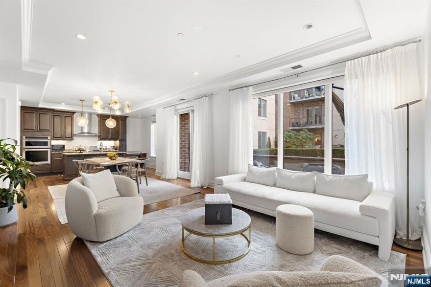 HENLEY ON HUDSON! Live on Cloud 9.. SOUTHFACING 1B 1 1/2 BATHS 1,064 SF INTERIOR +8X8 SF DEN/OFFICE + 280 SF SUPER-SIZED GARDEN PATIO +8X4 ft STORAGE LOCKER + WALK-IN ORGANIZED CLOSET + GUEST POWDER ROOM +LARGE CAPACITY LAUNDRY IN UNIT + 1 INDOOR PARKING SPACE INCLUDED + DREAM COMMUTE + PET FRIENDLY! This Light Airy Bright Sunny Spacious Open Layout boasts New Natural Light Oakwood Floors Throughout, Sanctuary Outdoor Patio adorned with English Gardens/Courtyard from this fabulous architectural wonder! Crown moldings, soffits, recessed lighting throughout! Electric Window Shades, Dreamy Drapery, Stainless Steel appliances, Marble spa w/ glass enclosed separate shower & deep soaking tub! Enjoy the Daily Scenic NYC Skyline Hudson River Commute to NYC via NY WATERWAY FERRY (FREE SHUTTLE ONSITE), HUDSONLIGHTRAIL to PATH/NY MTA, or NJ TRANSIT BUS 158 to LINCOLN TUNNEL or GWB in a NY MINUTE! Port Imperial Hudson Riverwalk + DOG RUNS + Weehawken Recreational Park w/ playground, community center/ pool, track & ballfield! Come &see before this goes! Amenities include CONCIERGE, OUTDOORPOOL, PLAYROOM, GYM, Yoga, Event, Cinema Rooms, Firepit, BBQ! One covered garage space included + Additional parking available for rent -pls call for details.