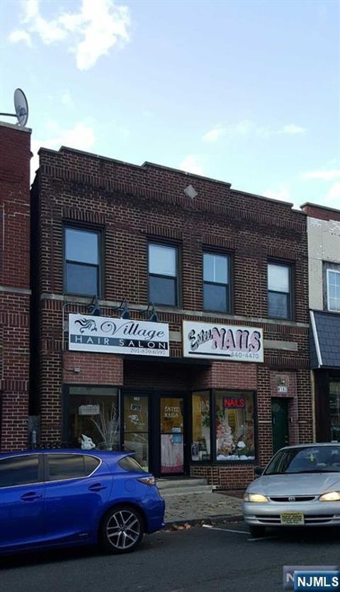 Photo of 182 Main Street, Ridgefield Park, NJ 07660 (MLS # 25043138)