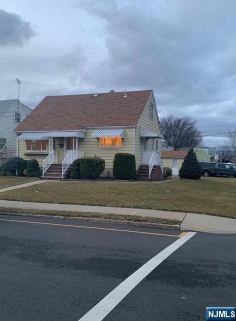 Photo of 21 Bellport Pl, Garfield, NJ 07026 (MLS # 25041501)