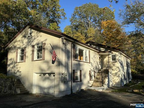 Photo of 563 Lake Shore Dr, West Milford, NJ 07421 (MLS # 25036531)