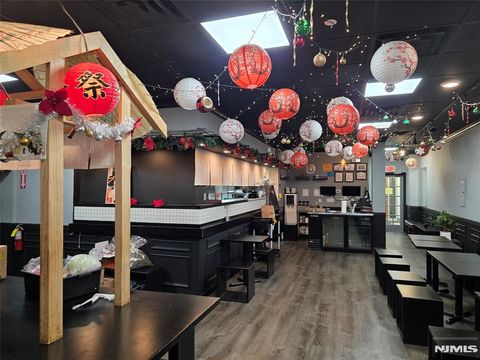 Photo of 232 Broad Avenue, Palisades Park, NJ 07650 (MLS # 25037435)