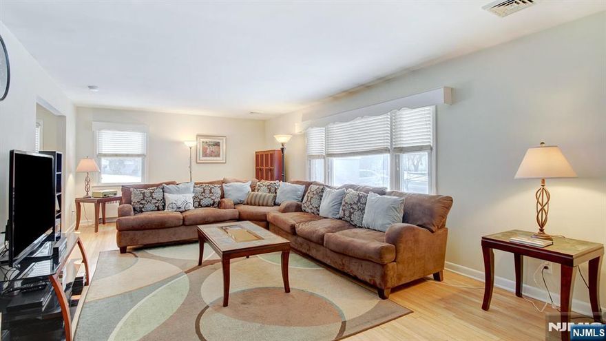 Discover comfortable living in this thoughtfully designed 3-bedroom offering generous, flexible space inside and out. A welcoming layout flows from the bright living room into a formal dining area and a spacious kitchen featuring a charming built-in country seat perfect for casual meals. Enjoy year-round versatility with a bonus rear room and a sunny 3-season space ideal for relaxing or entertaining. The finished basement expands your living options with a cozy office nook, full bath ready for your personal touch, and direct walkout access to the two-car garage. Upstairs, the primary suite offers double closets and its own private bath, complemented by two additional bedrooms and a full hall bathroom. Outside, a fully fenced backyard sets the stage for gatherings, grilling, and easy outdoor enjoyment. A home designed for everyday living with room to grow.