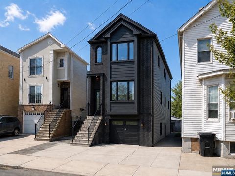Photo of 313 Warren Street, Harrison, NJ 07029 (MLS # 26020170)