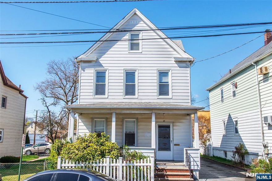 YOUR SEARCH ENDS HERE! Investor Special or Great Starter Opportunity! This 2-family home is full of potential and is waiting for your personal touch. Enjoy mornings or evenings on the inviting front porch, perfect for relaxing or entertaining. The first-floor unit offers 1 bedroom and 1 full bath, while the second-floor unit includes 2 bedrooms and 1 full bath. A finished attic provides two additional rooms that can be used as bedrooms, offices, or bonus living space. Both units feature hardwood floors and lots of natural light. Conveniently located near shops, schools, and public transportation this property presents a fantastic opportunity to build equity or create rental income. Bring your vision and unlock the potential in this versatile home!