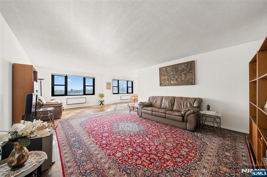 Spacious Southeast Corner Condo w Spectacular NYC & Hudson River Views. Generous in size at 1,640 sq. ft., this desirable J-line 2-bedroom, 2-bath corner condo on the 19th floor offers breathtaking panoramic views of the Manhattan skyline and Hudson River from every room â€” plus a large private covered balcony perfect for relaxing. Step inside to a bright and airy L-shaped living and dining area, ideal for both comfort and entertaining. Imagine sipping your morning coffee or dining al fresco on your private balcony while taking in the twinkling city lights, Empire State Building, and Hudson Yards views. The spacious primary suite features stunning NYC views, a walk-in closet, and an ensuite bath. The second large bedroom also offers wide windows with skyline views and its own walk-in closet. A windowed kitchen with a pantry and abundant cabinetry provides both functionality and potential for your personal upgrades. The Parker Imperial offers exceptional amenities, including a 24-hour doorman, on-site fitness center, outdoor heated pool, and laundry facilities on every floor (with two washers and dryers per floor). Located in North Bergen, adjacent to a 167-acre park with a lake and free tennis for residents, this home provides a rare blend of nature, convenience, and city access. Transportation to NYC, Jersey City, and Hoboken is right at your door, w shopping & dining nearby. Bring your personal touch and make this spectacular home your own. Call Jimmy Lopez 201-741-6298.