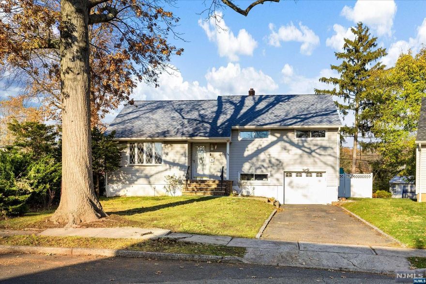 Large Split Level, FOUR Bedrms,Two Full Bathrms,Den,Rec.Rm,Central A/C,Well kept,Large Rear Yd Privacy Fence, Above ground pool,Near Elementary and Middle Schools,NY Trans,Highways.