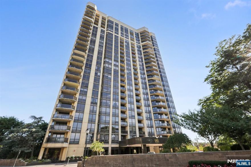 Enjoy luxury high-rise living in this bright and spacious 1-bedroom, 1.5-bath residence located in one of Fort Leeâ€™s premier buildings. The open-concept living and dining area features floor-to-ceiling windows, filling the home with natural light and offering beautiful views. A private balcony provides a perfect spot to relax and take in the scenery. The updated kitchen boasts sleek white cabinetry, quartz countertops, and stainless-steel appliances. The large bedroom includes generous closet space and an en-suite bathroom with a soaking tub and separate shower. Additional features include a convenient powder room, in-unit washer/dryer, and beautiful modern flooring throughout. This full-service building offers 24-hour concierge, fitness center, pool, and garage parking. Located just minutes from the George Washington Bridge, NYC transit, shopping, dining, and parks, this home combines comfort, convenience, and style in a prime location.