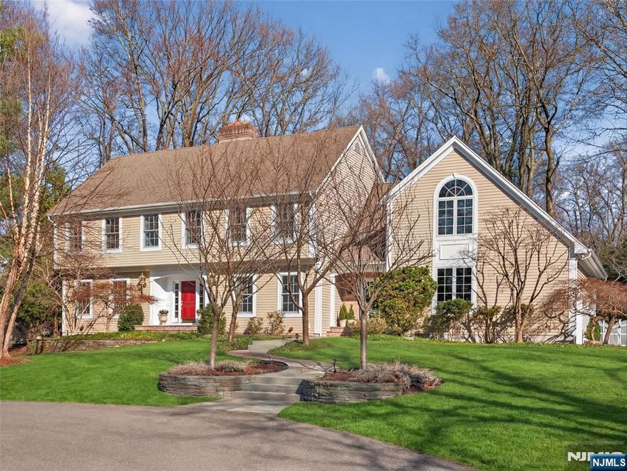 Modern Elegance, Classic Design, Quality Construction & Exquisite Custom Millwork come together in this stunning Colonial on a cul-de-sac in Wyckoff. Built by John Avanzato, in 2001 this special home features, 9 ft/Vaulted ceilings on the main level, HWD floors and the ideal floor plan - perfect for today's lifestyle! The backyard is your own private resort w/ an in-ground, gunite, salt-water pool, bluestone patio, walkways, and a custom pool house. Prepare to be wowed as you step into the foyer that opens to the LR w/ Gas FP and DR. The library w/ built-ins overlooks the backyard and is a serene setting to work or relax, Step into the Great room w/Vaulted ceilings, a wood burning FP and a wall of windows perfect for large gatherings or peaceful moments. The Kitchen w/custom Cabinets and high-end app, a seated island and dining area that overlooks the amazing yard. Take the back staircase to a private suite w/ a BR, Fbth and a living room that is ideal for extended family. The main staircase leads to the Primary bedroom w/ a tray ceiling and Cove lighting, LUX Primary bath, Huge WIC w/ Built-ins and attached Office, Nursery (Flex Space or 5th bedroom) There are 2 add'l bedrooms and a Fbth. The finished basement has a Rec room, Fbth, Gym and tons of Storage. Amenities inc: full house generator, multi-zone and radiant heat, Central air, sprinklers, security, Custom Kolbe windows, 3 car heated garage with high ceilings and so much more! This home truly has it all!