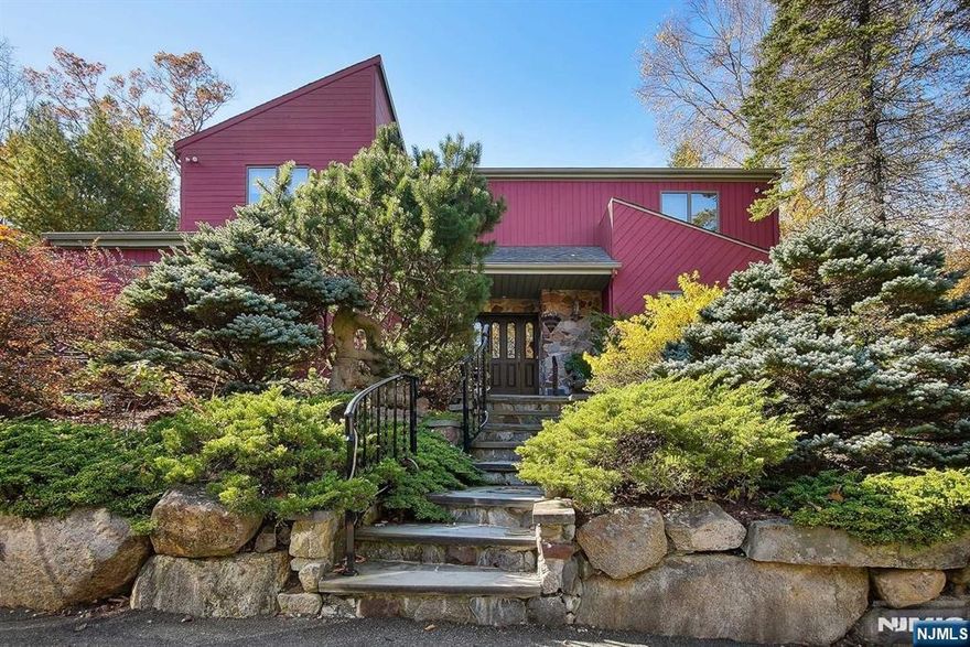 Situated in the heart of Smoke Rise close to everything yet quietly tucked away with a circular drive and extra parking welcoming you. Step into the stone-lined entry to soaring entry foyer. Formal living rm and dining rm to the right and entry from garage with powder room tucked away on the left. Sprawling kitchen with gleaming Silestone countertops opens to quaint office or family rm with w/b fireplace and huge breakfast rm and great rm with 3-way fireplace! Walls of glass surround with views of magnificent rear yard oasis to include newly renovated koi pond, waterfall with stone patio, newly resurfaced fiberglass heated pool w/new filter, stone bar, included gas bbq, new generator 2023, gutter filters, outdoor lighting, wrap around decking... Retreat upstairs to a main bath with vaulted ceiling, 3 secondary bedrooms, romantic master bedroom with huge walkin closet, copper tub, large shower, custom vanity...The basement is finished and offers a full bath, closet, kitchenette...