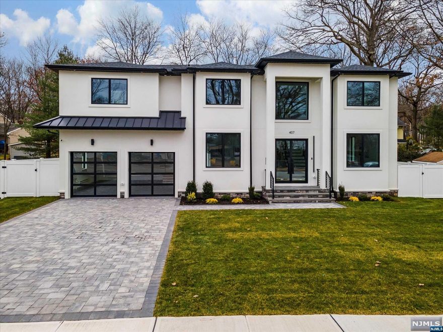 BRAND-NEW CONSTRUCTION masterpiece on Paramus' highly desirable East Side, w/prestigious schools - TOP Bergen County builder. Luxurious home boasting 6,500+ sq ft & featuring 6 spacious beds & 6 impeccable baths. A grand 2-story foyer leading to a magnificent 2-story (20-ft) Great Rm, offering extraordinary sense of space & natural light. 1st-floor w/ceiling soaring to impressive 10ft & houses dream imported Gourmet Kitchen w/custom cabinetry, HUGE island, breakfast area, Butler's Pantry & high-end appliances - ideal for hosting large groups. Exceptional home boasting luxurious upgrades & finishes w/finest attention to detail: Anderson 400 series windows; Calcata quartz counters; Wolf range & hood, Subzero refrigerator & Cove dishwasher; Sharp microwave; tray-ceiling in all beds & primary bath; poured concrete foundation; hardwood floors; gorgeous baths w/custom vanities; paver's patio; 3-zone cooling/heating; lawn sprinklers, oversized 2-car garage; & fence.