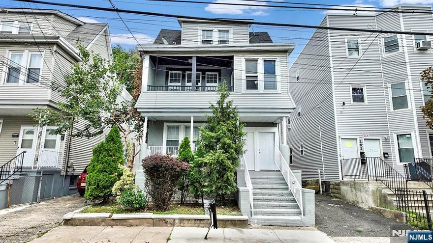 Spacious two-family home in Newark! Unit 1 (occupied) features 3 bedrooms and 1 bath. Unit 2 offers 4 bedrooms, 1 bath, plus updated kitchen and baths. Both units include hardwood floors throughout and separate utilities. Conveniently located near schools, shopping, public transportation, and major highwaysâ€”perfect for commuters. Great investment property or owner-occupant opportunity with rental income potential.