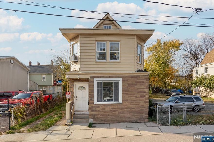 Welcome to this newly renovated two-family home on the West Orange/Orange border! Both units feature updated kitchens and baths with granite countertops, stainless steel appliances, vinyl flooring, and central air and heat. Utilities are fully separate, with a roof, HVAC systems and hot water heaters replaced three years ago. The first-floor unit offers a living room, two bedrooms, a spacious eat-in kitchen, and a full bath. The second-floor duplex provides a large living room, eat-in kitchen, full bath, and three bedrooms. Additional highlights include a long driveway accommodating 3+ cars and a finished basement with laundry hookups for added convenience. Ideal for investors seeking rental income or homeowners looking to live in one unit while renting the other. Flood insurance may be required; current policy is approximately $1,736 per year. Don't miss this opportunity! Open House Saturday Nov 15th from 12 - 2pm